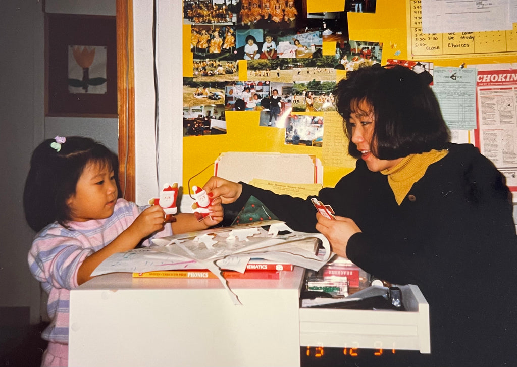 A childhood photo of Jane Dua, founder of Nunchi, with her mother