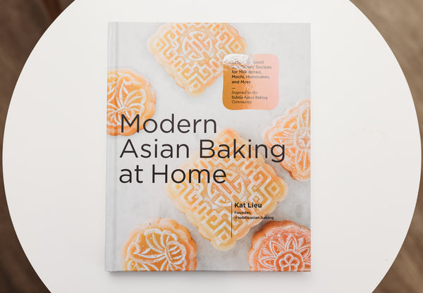 A photo of Modern Asian Baking At Home, a cookbook written by author and founder of the Subtle Asian Baking community Kat Lieu.