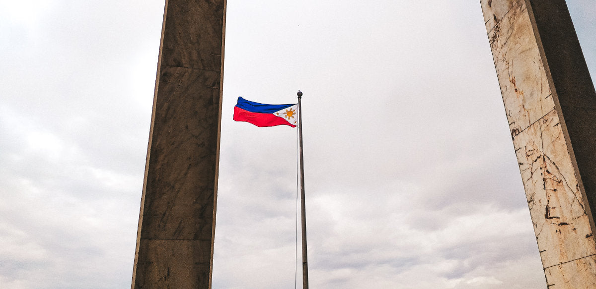 A Filipino flag waving high.
