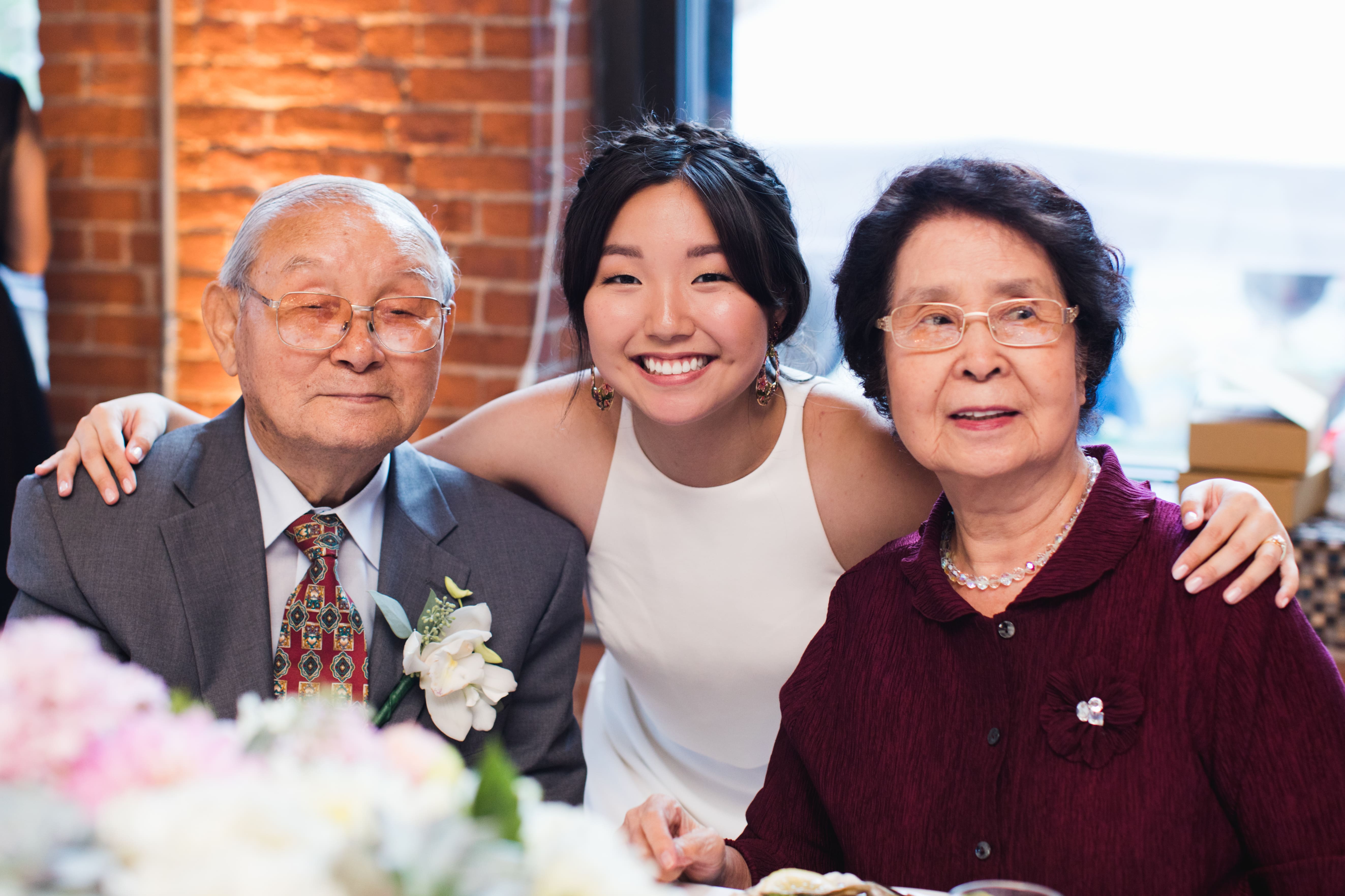 Photo of Halmi founder Hannah Bae and her grandparents at Hannah's wedding.