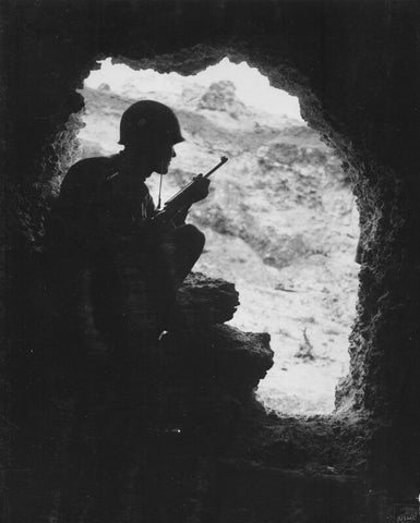 man hiding in cave