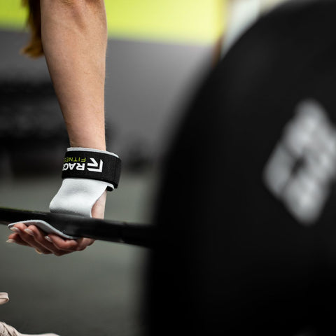 Lift Grips on hands lifting barbell