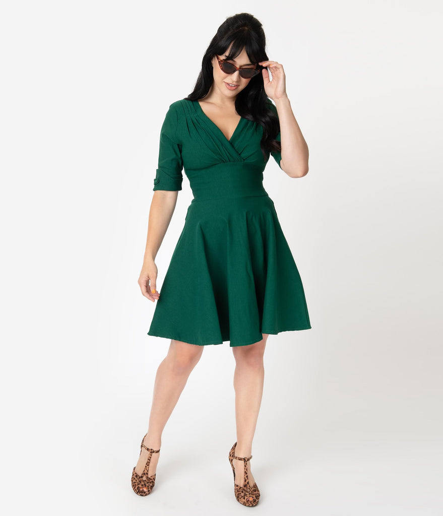 emerald green fit and flare dress