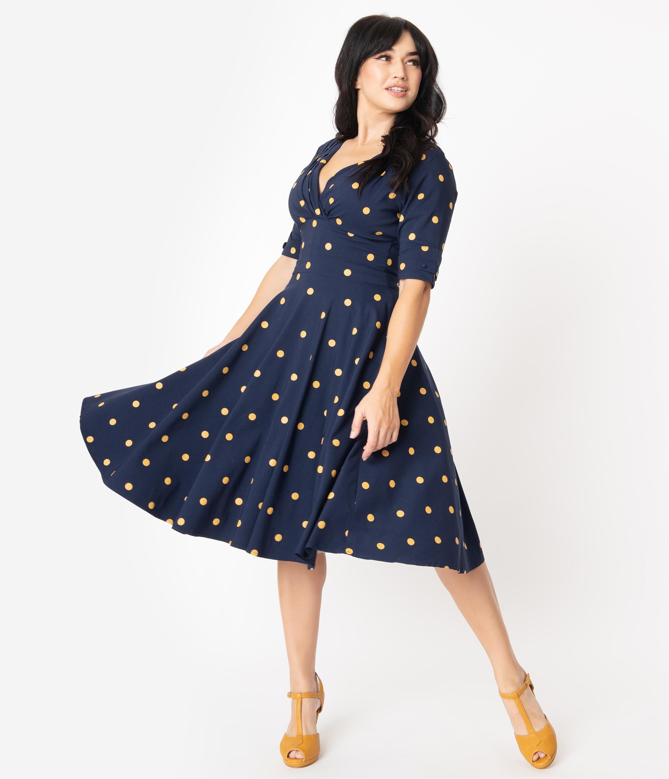 

Unique Vintage Navy & Mustard Polka Dot Delores Swing Dress With Sleeves