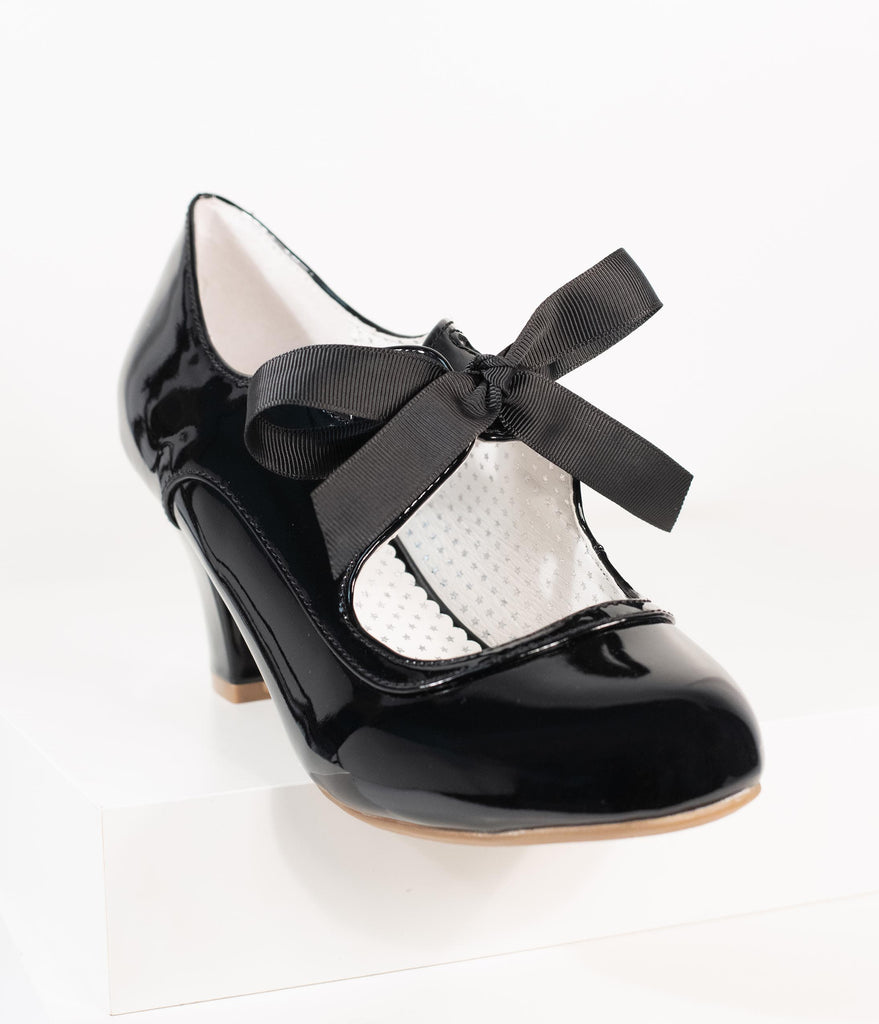 black patent leather shoes with bow