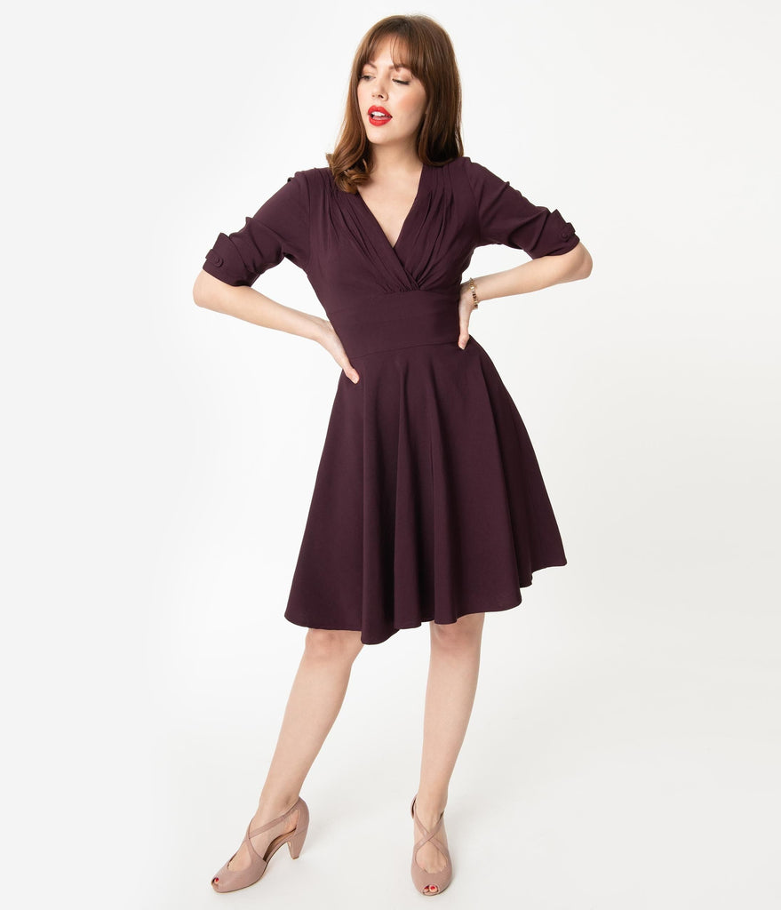 purple fit and flare dress with sleeves