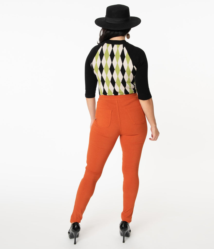 orange cigarette trousers