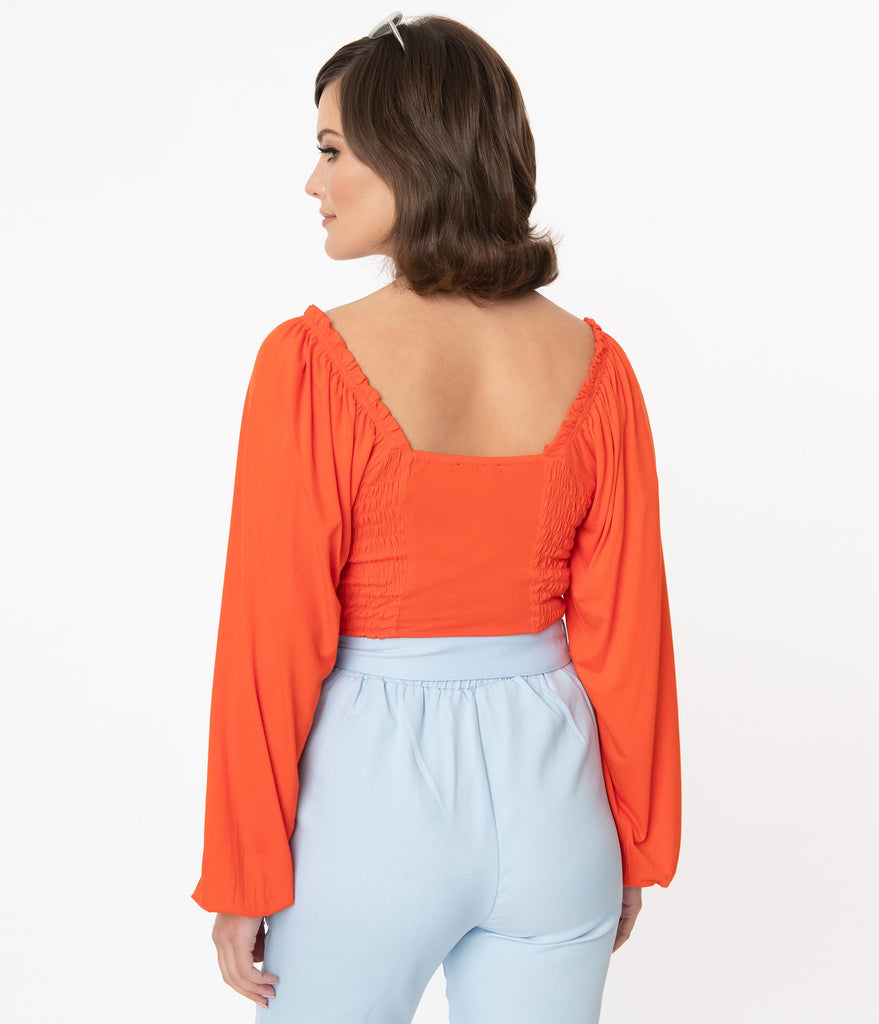 orange smocked top