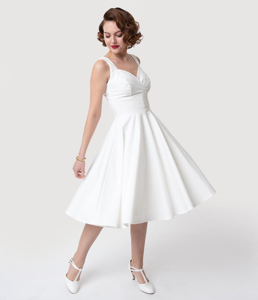 white 50s swing dress