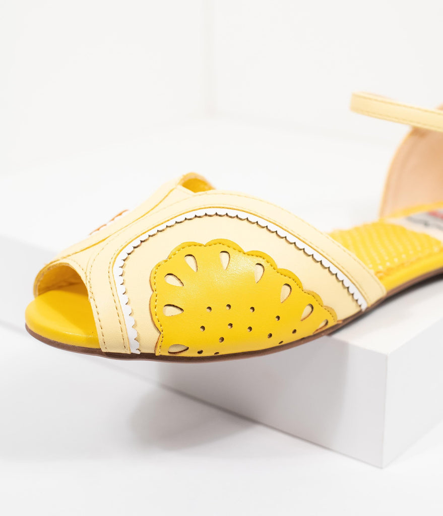 yellow closed toe shoes