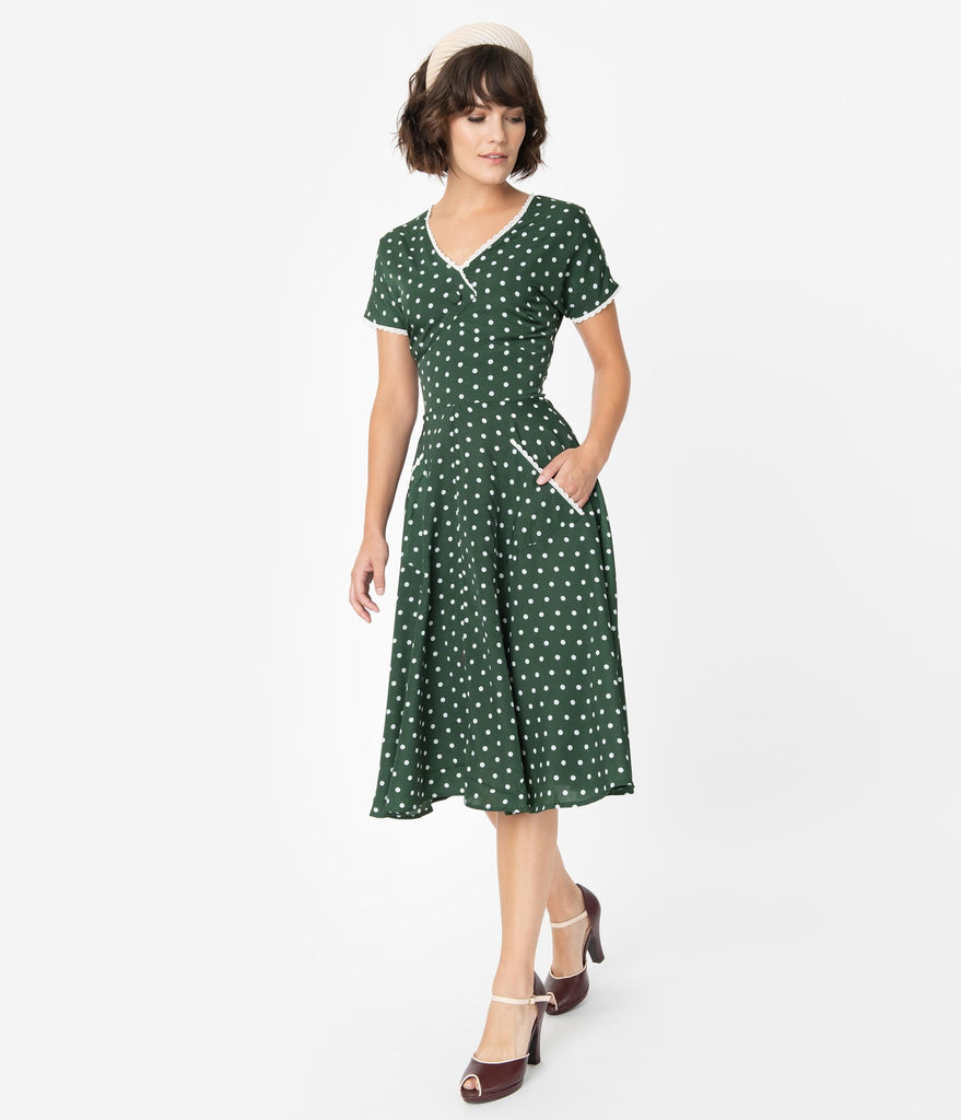 green dress with white polka dots