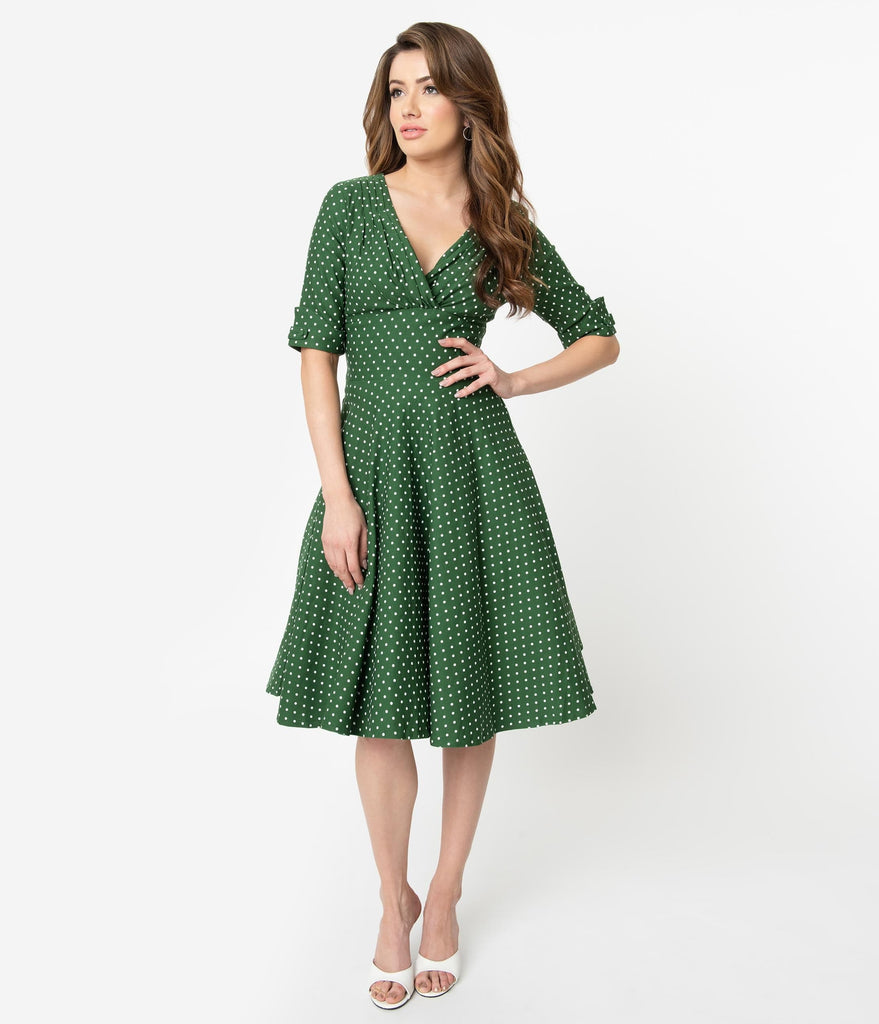 green dress with white polka dots