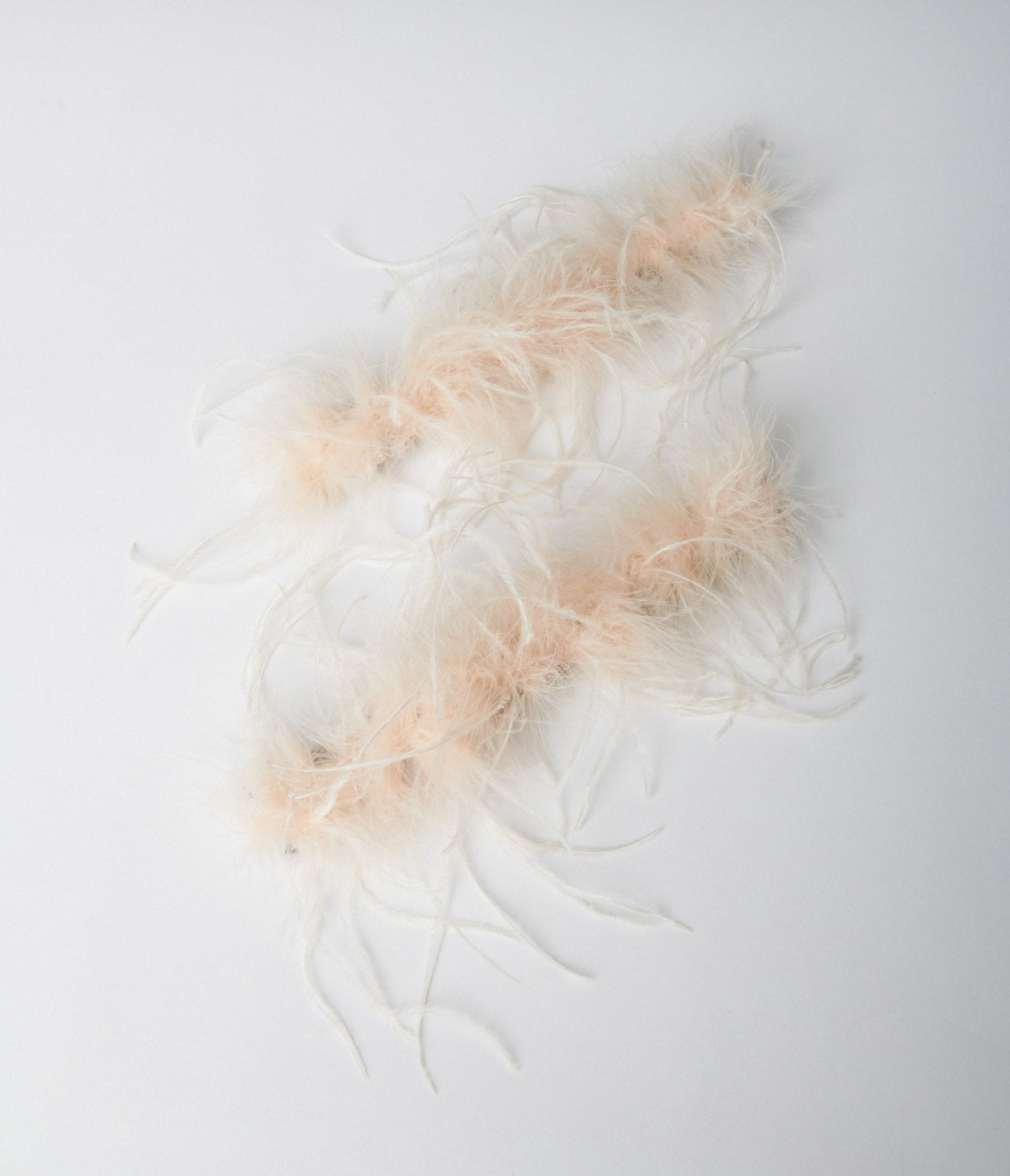 

Beige Faux Ostrich Feather Cuffs