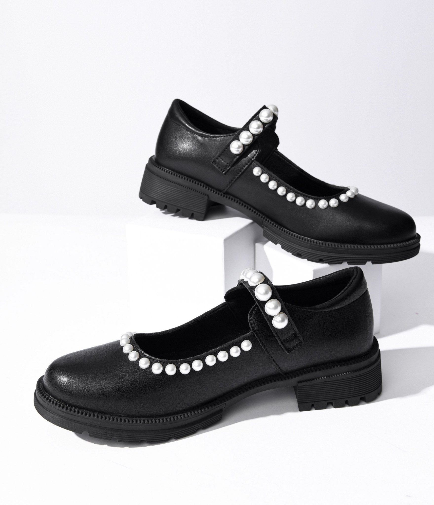 

Black Leatherette & Pearl Mary Jane Flats