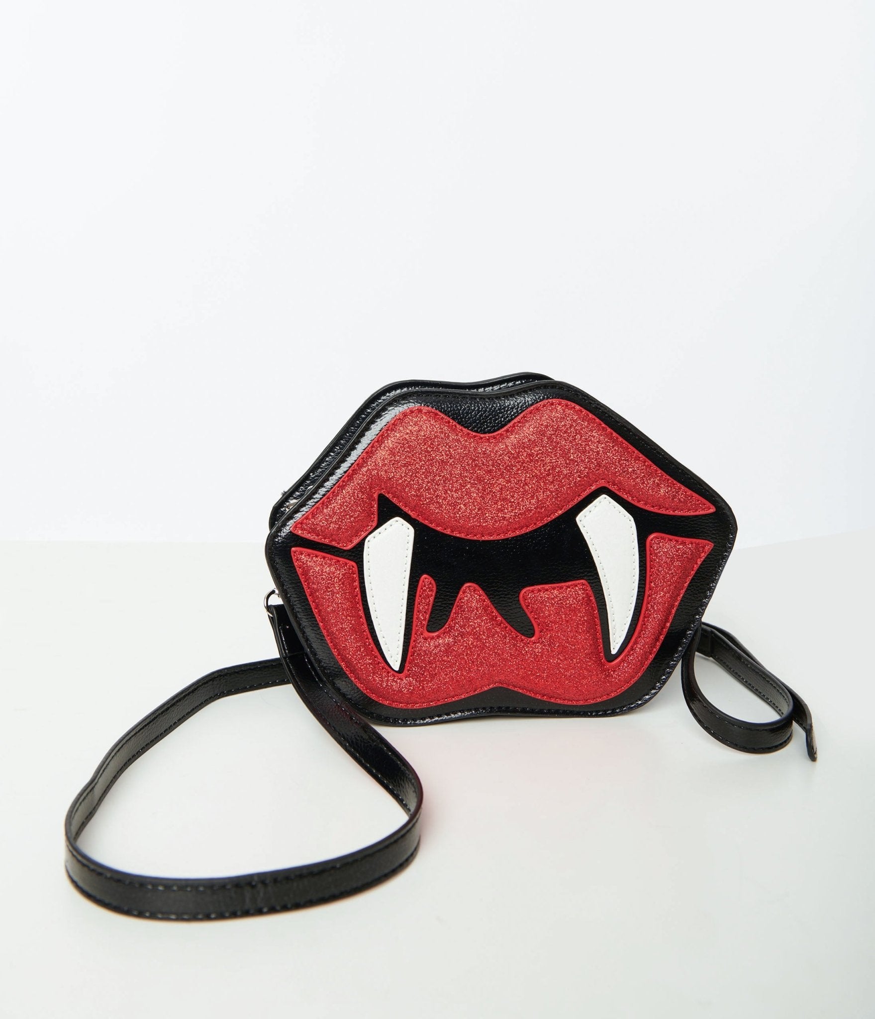 

Black Patent Leatherette Glitter Vampire Mouth Crossbody Bag