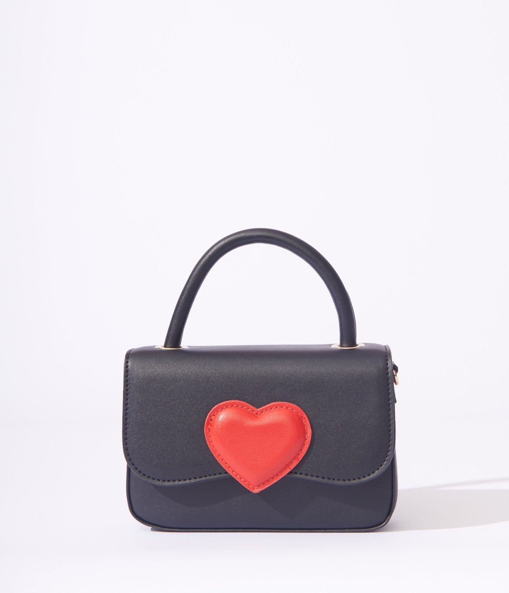 https://cdn.shopify.com/s/files/1/2714/9310/products/black-red-heart-mini-handbag-317185.jpg?v=1703093760