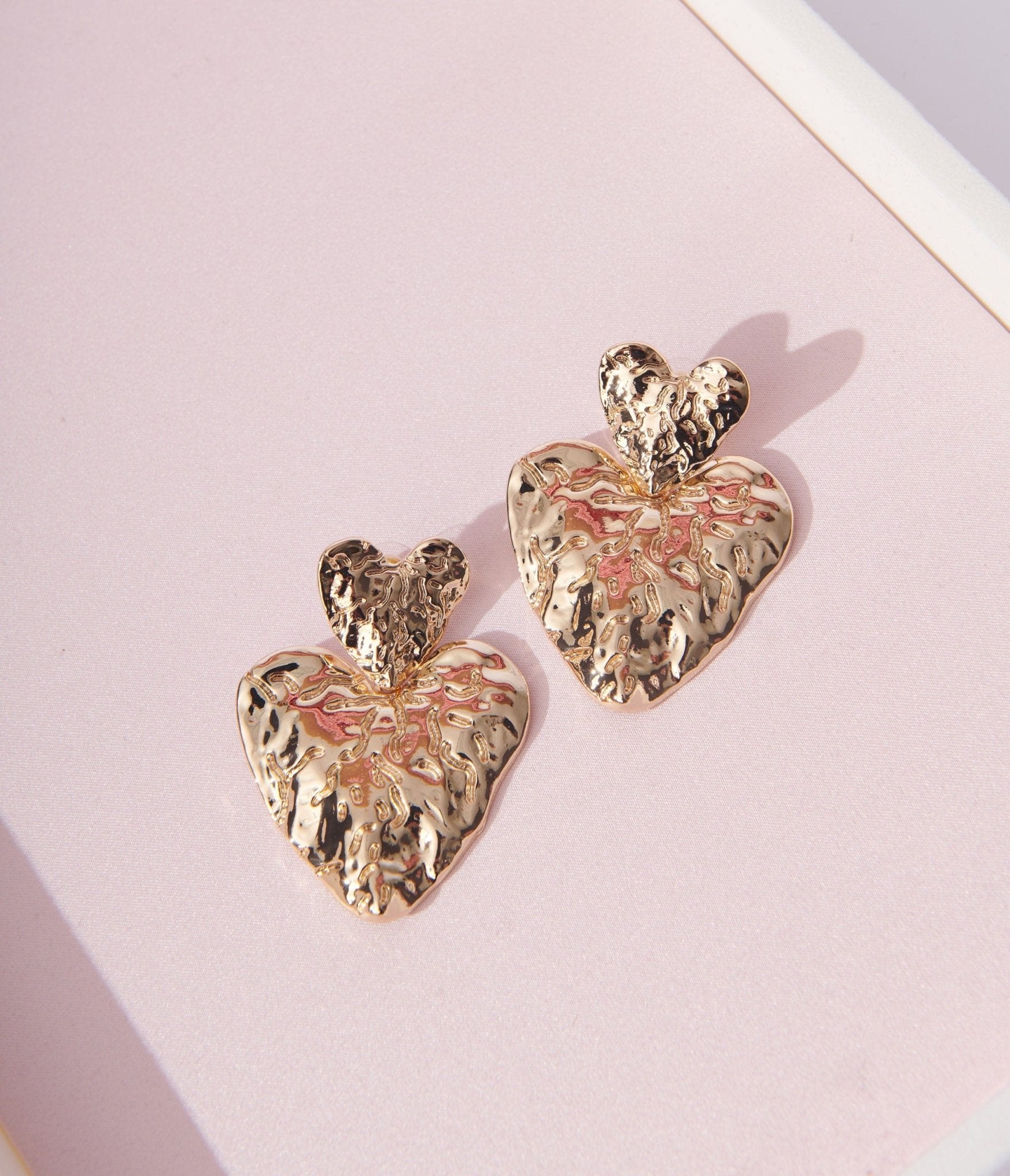

Gold Melt Dual Heart Drop Earrings