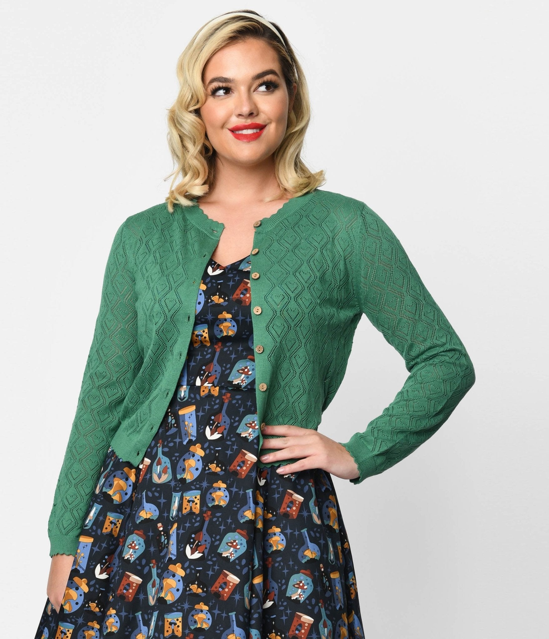 

Green Perforated Heart Cardigan