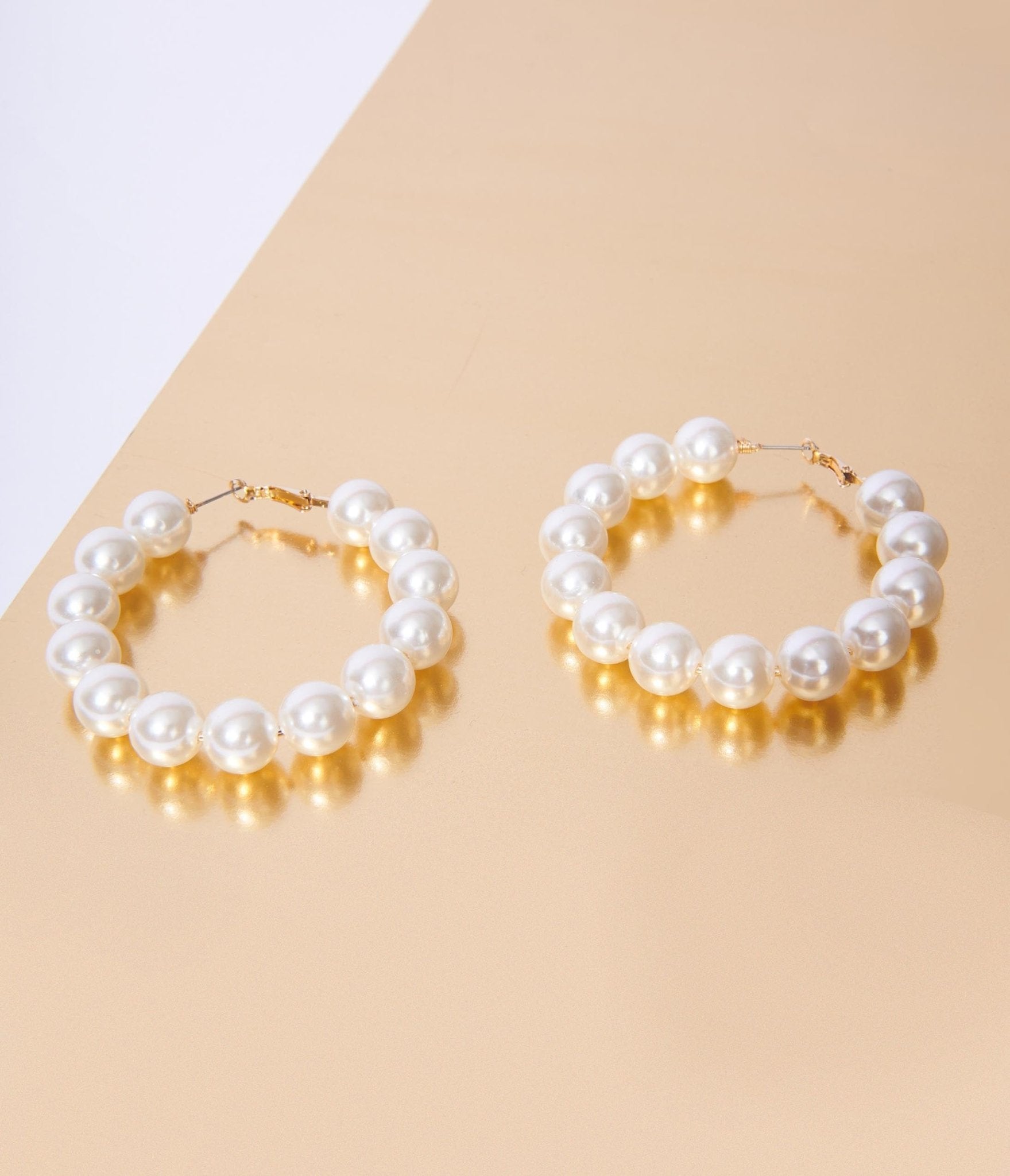 

Ivory Chunky Faux Pearl Hoop Earrings