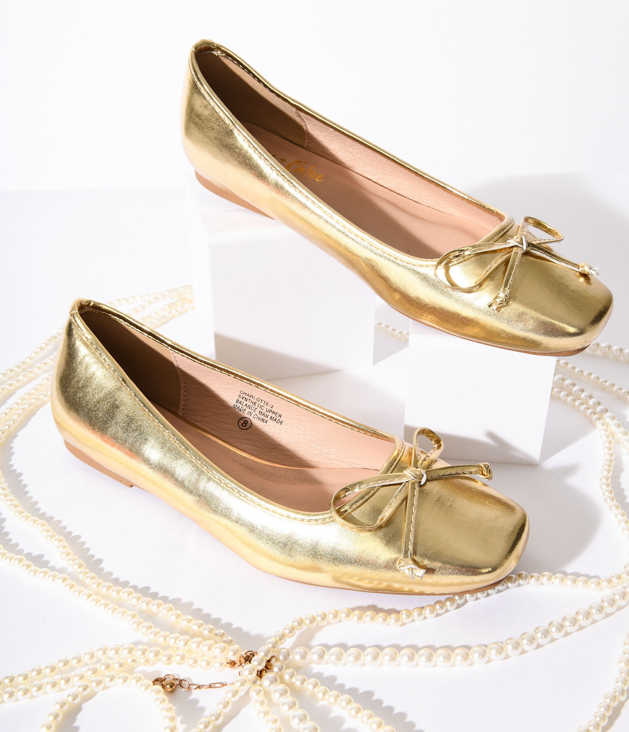 

Metallic Gold Leatherette Bow Flats