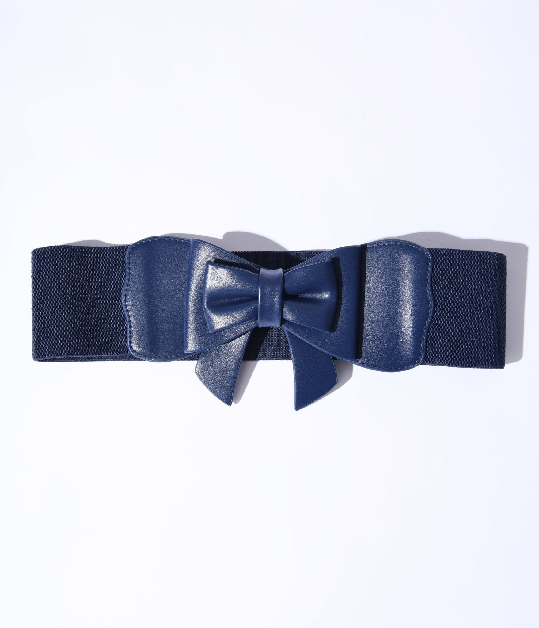 https://cdn.shopify.com/s/files/1/2714/9310/products/navy-play-it-right-bow-belt-258506.jpg?v=1703096438