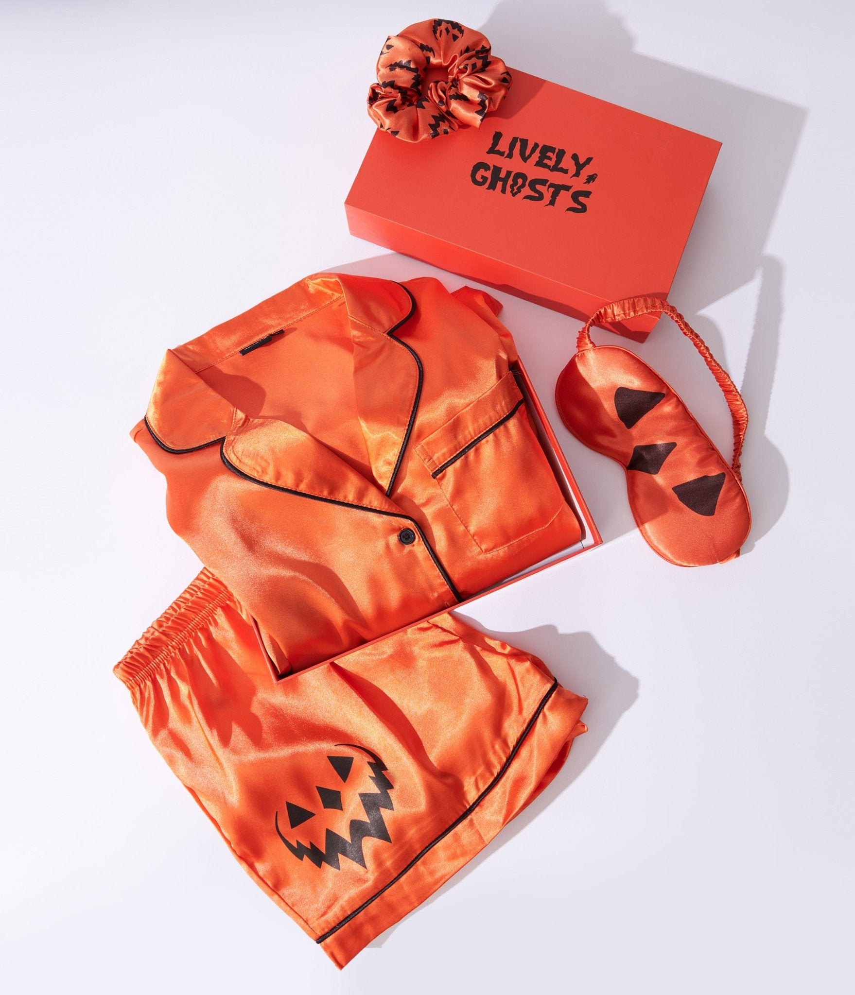 

Orange Satin Haunted Hallows Samhain 4 Piece Sleepwear Set