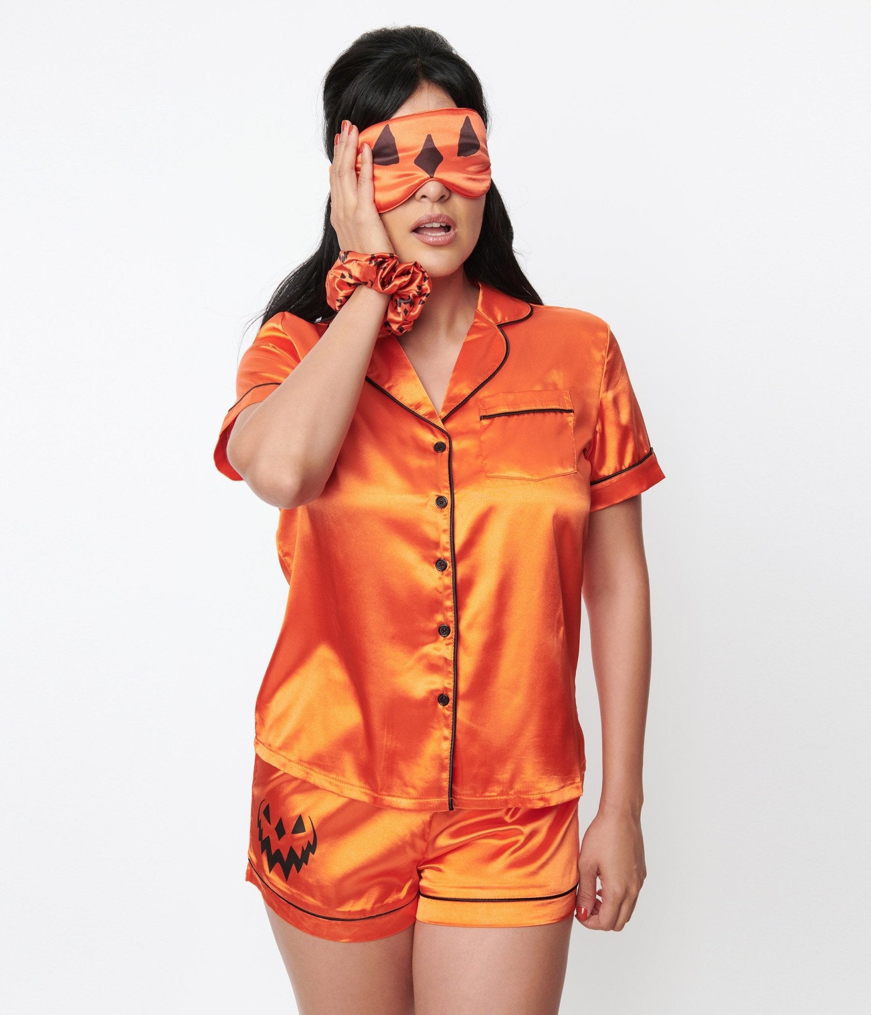 https://cdn.shopify.com/s/files/1/2714/9310/products/orange-satin-haunted-hallows-samhain-4-piece-sleepwear-set-388943.jpg?v=1703096481