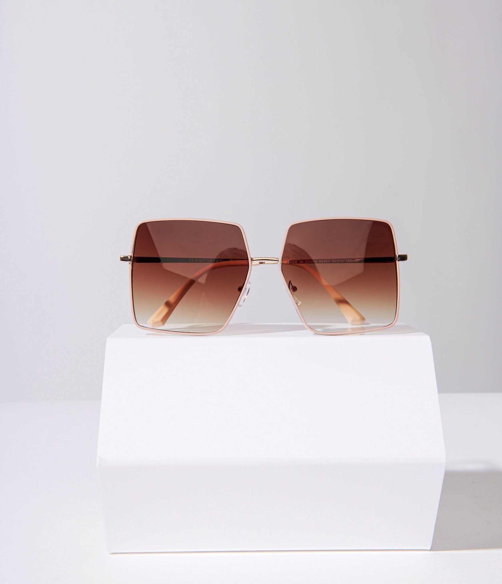 

Rose Gold & Amber Tint Oversized Sunglasses