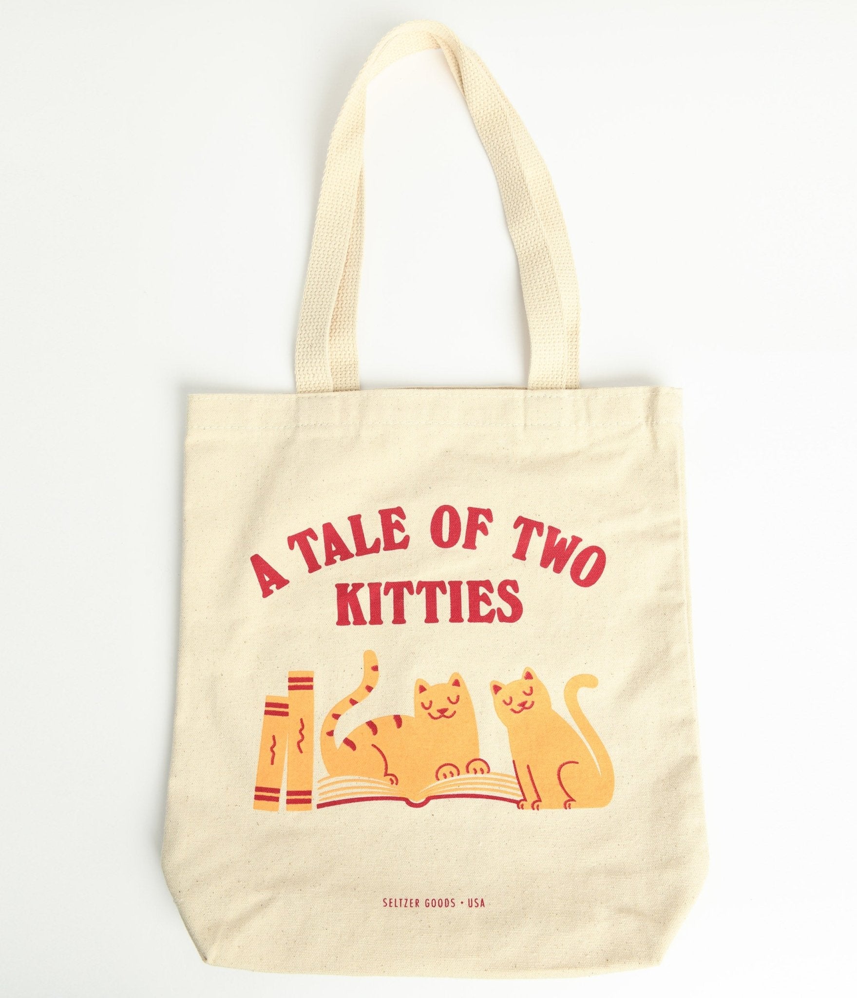 https://cdn.shopify.com/s/files/1/2714/9310/products/tale-of-two-kitties-canvas-tote-bag-973203.jpg?v=1703098195