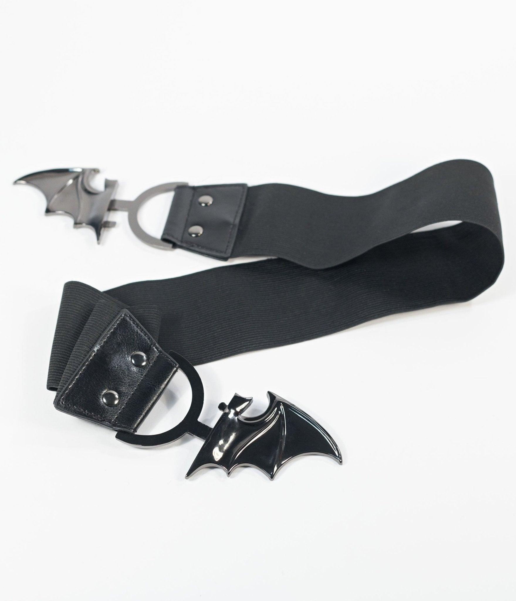 https://cdn.shopify.com/s/files/1/2714/9310/products/unique-vintage-black-bat-cinch-belt-885071.jpg?v=1703098738