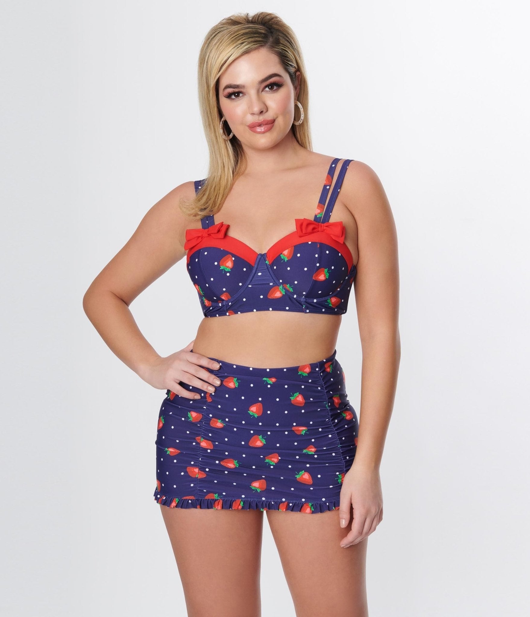 Vintage Bathing Suits | Retro Swimwear | Vintage Swimsuits Unique Vintage Navy Strawberry Pin Dot Bowed Over Swim Top $19.97 AT vintagedancer.com