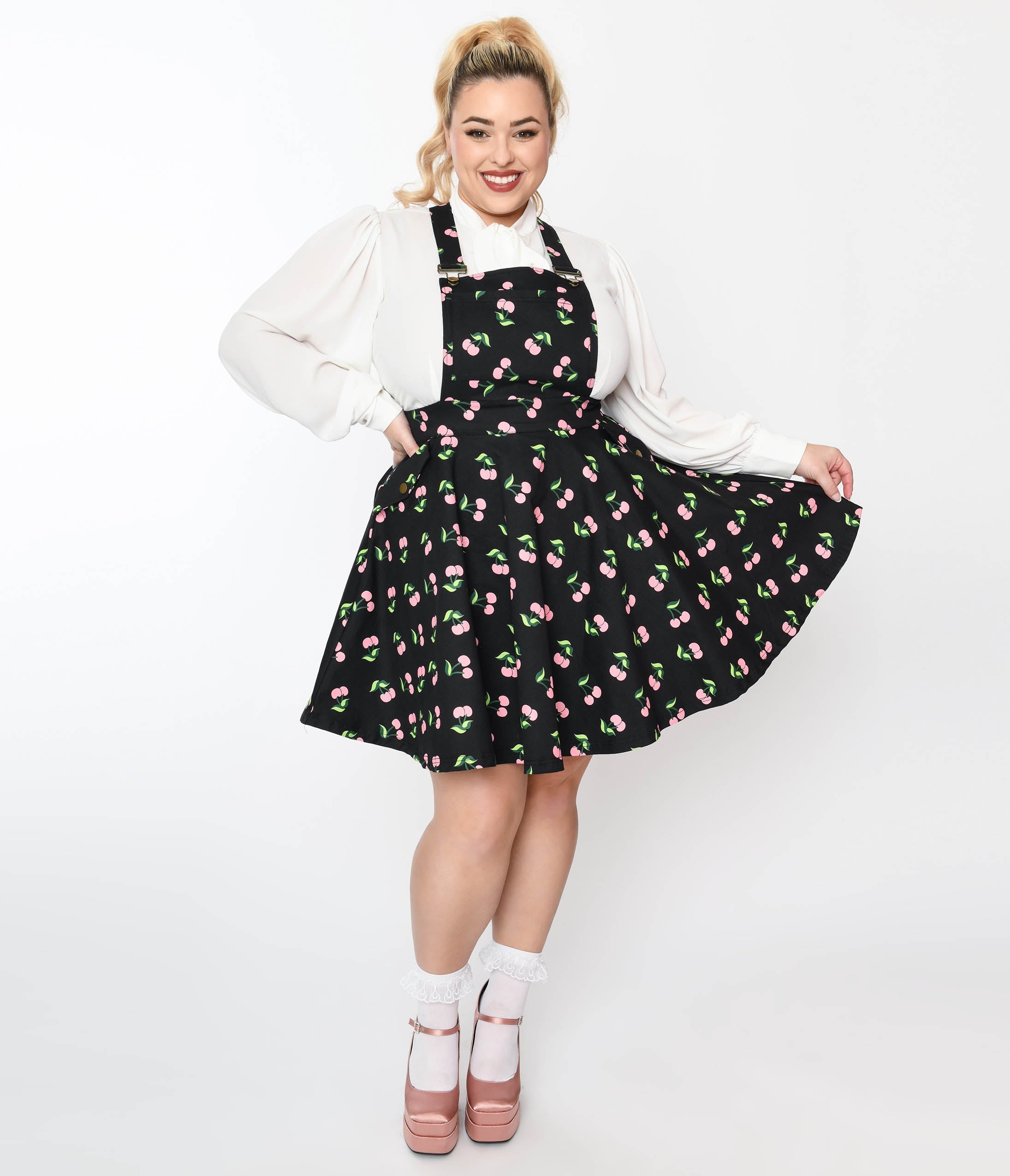 

Unique Vintage Plus Size Black & Pink Cherries Brionne Pinafore Skirt