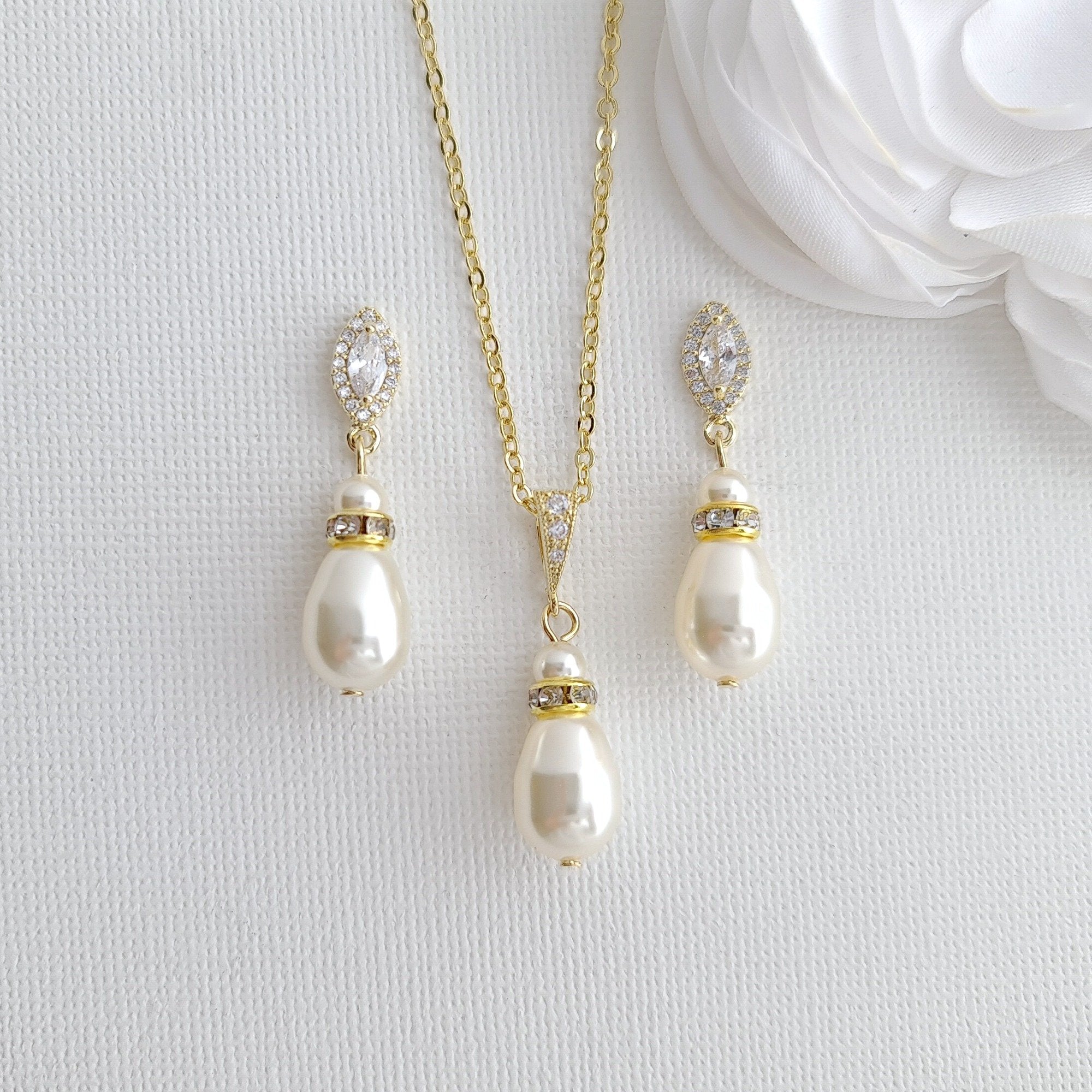 pearl earrings set in gold