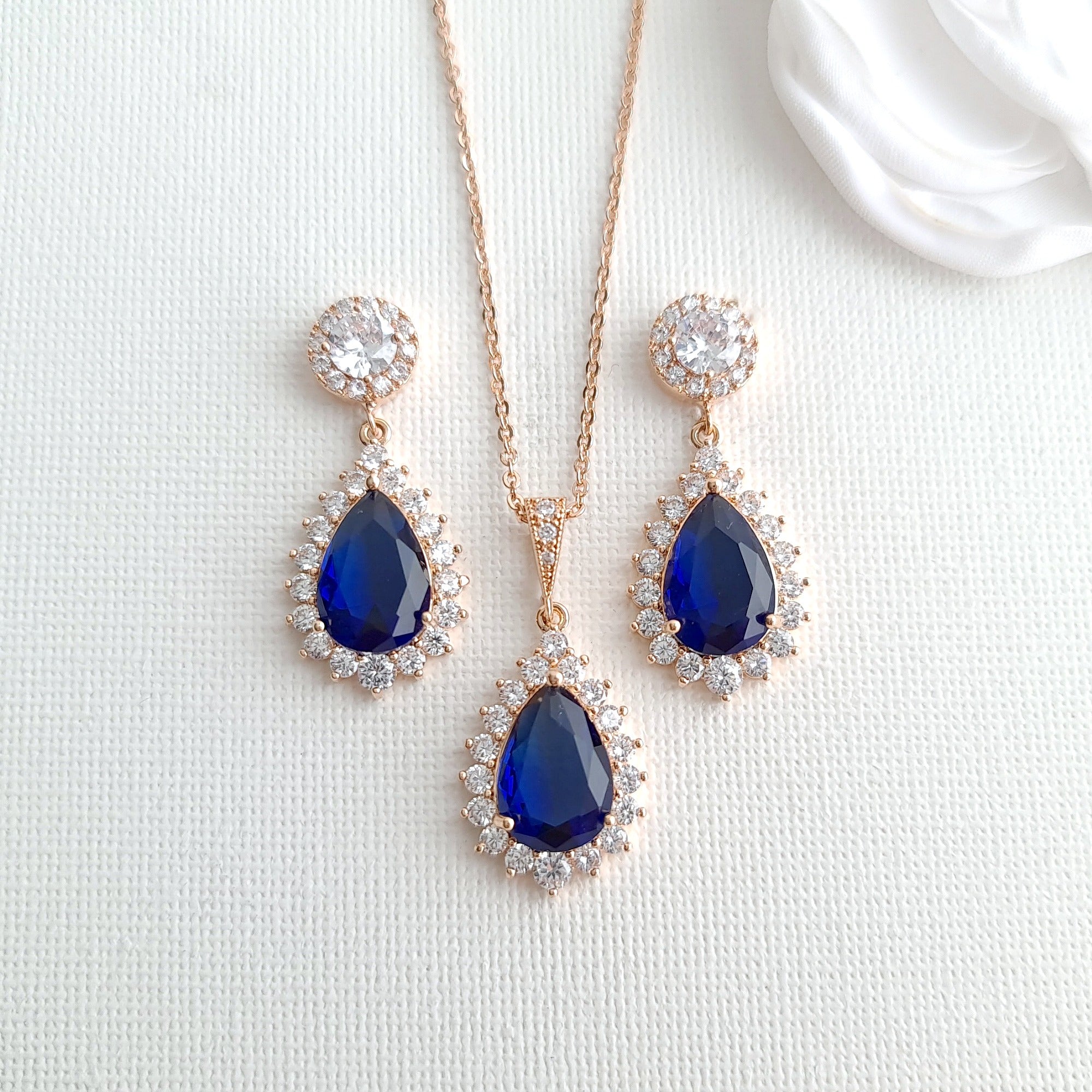 This stunning sapphire necklace and earring set is a must-have for your jewelry  collection! | Little Jewellers
