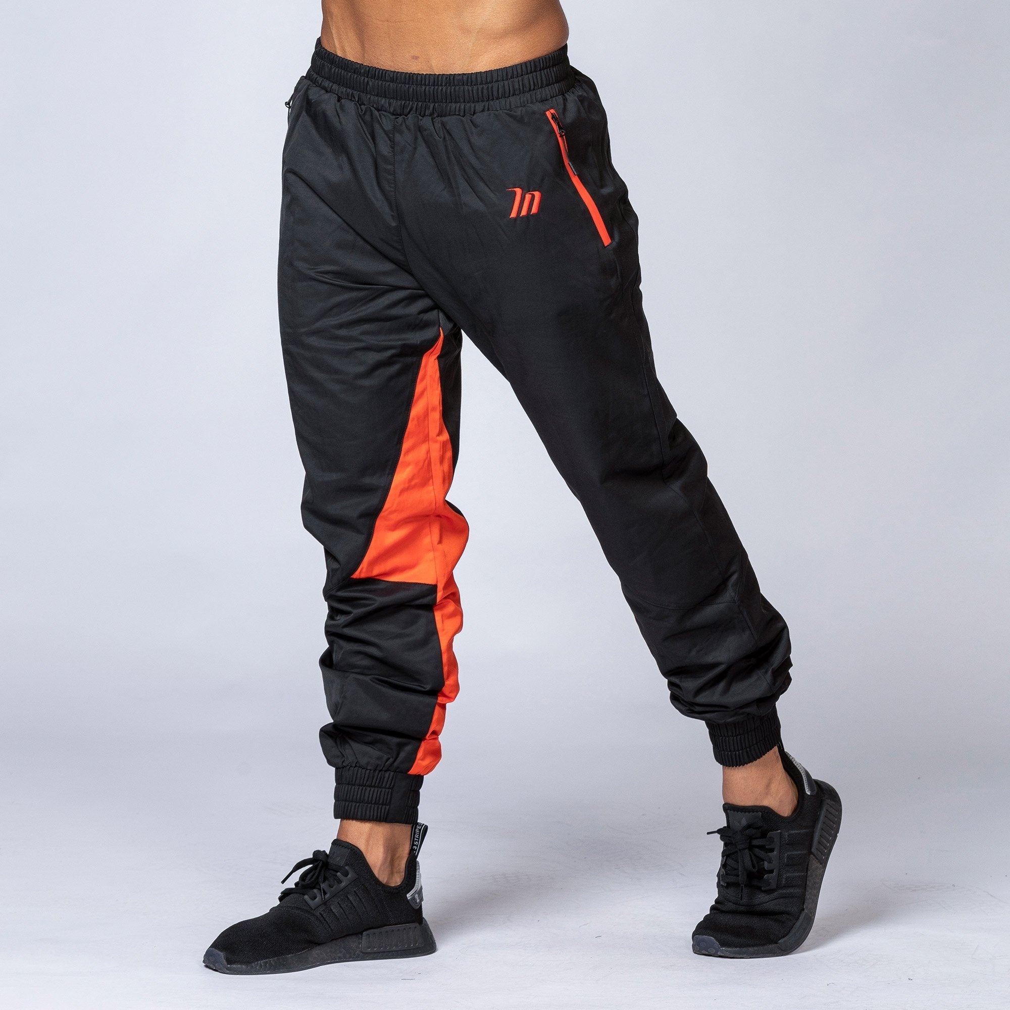 black and orange tracksuit