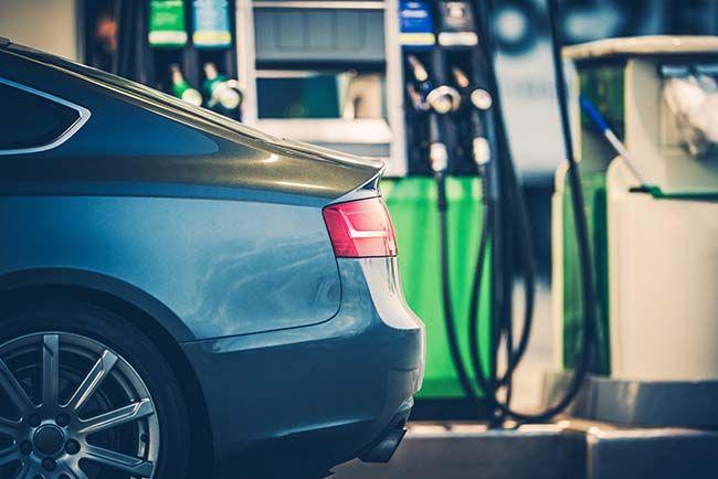 Gas Station Car Refueling. Purchasing Gasoline or Bio Diesel Fuel at the Gas Station.