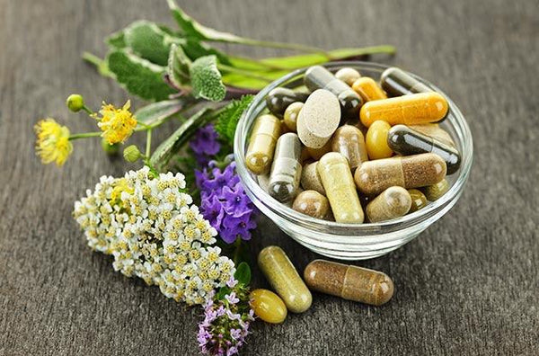 Herbs with alternative medicine herbal supplements and pills