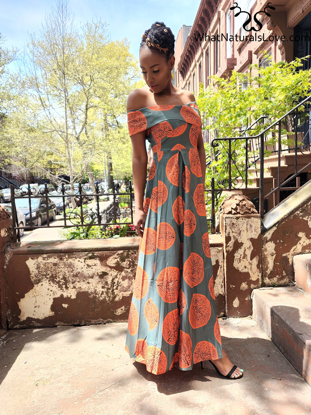 Sexy Afrikaanse off-shoulder maxi-jurk.