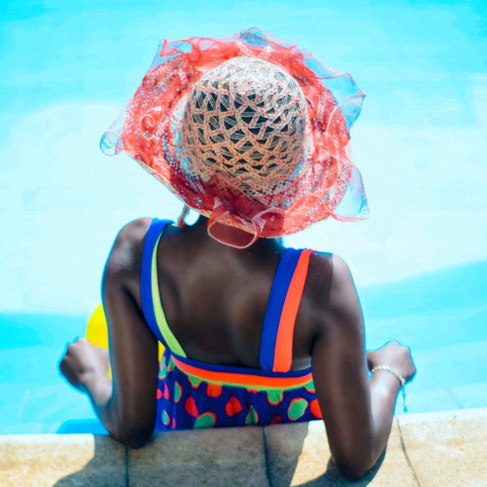 Black women with weaves at the pool 