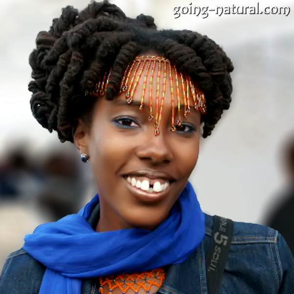 Nzinga’s barrel roll locs updo