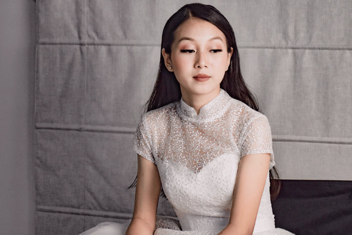 A Bride with Classic Bridal Makeup Sitting Quietly