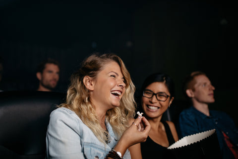 happy people watching a movie