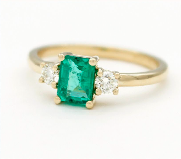 Emerald cut engagement ring trilogy setting diamond yellow gold dainty jewellery ring