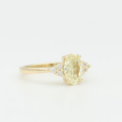 Fancy yellow oval diamond yellow gold engagement ring
