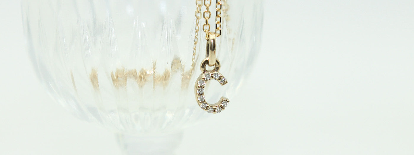Custom 9ct gold pendant charm set with a constellation of small round diamonds
