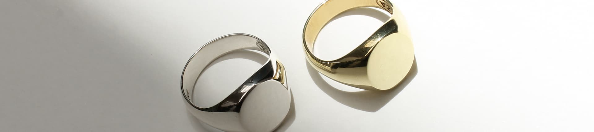 Gold and silver signet rings for men.
