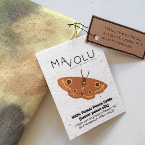 Cherry stone pillow hangtag made from seed paper
