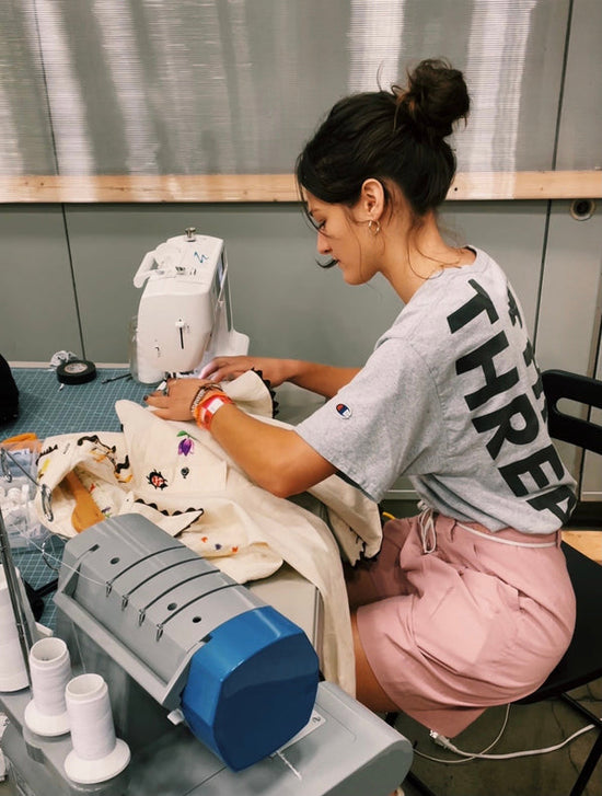 A woman working on sustainable apparel