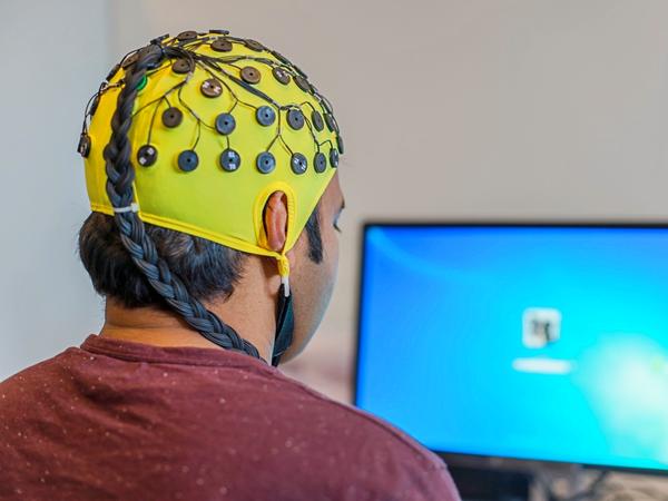 Strange wellness practice watching brain waves