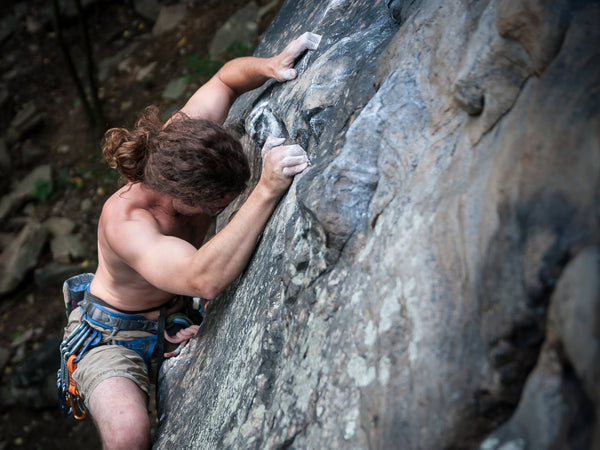 chalk hands rock climbing